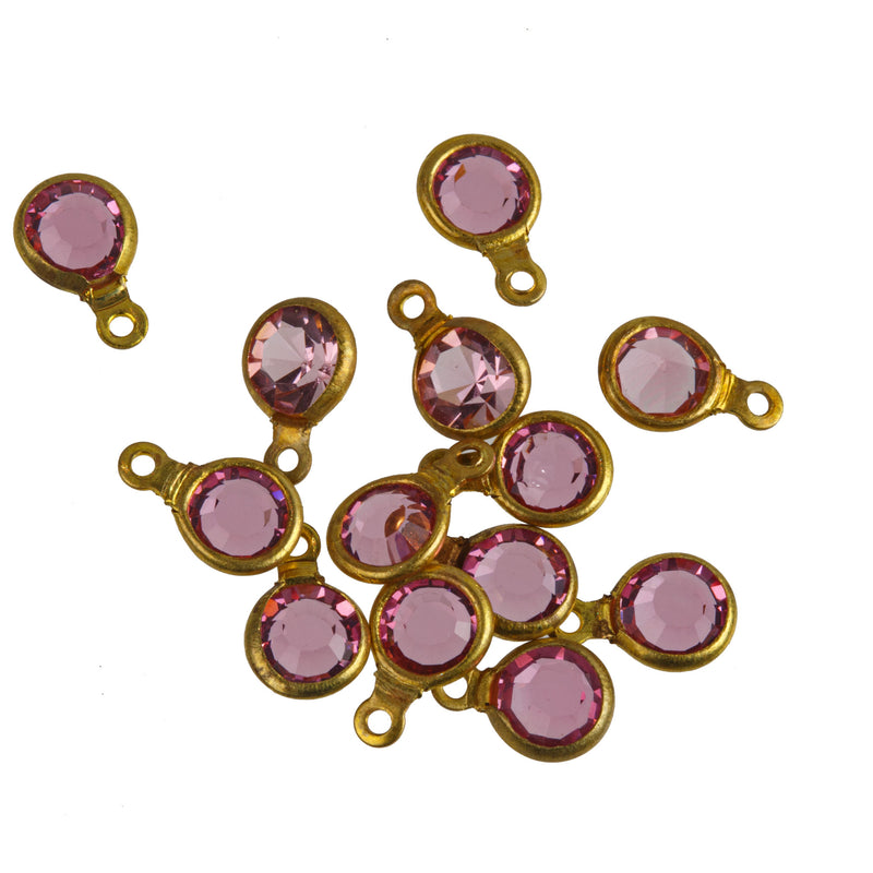 Austrian crystal and brass rounds-Size 17ss Rose Pink, 1 ring, 4.5mm. Pkg 12. b10-0117f