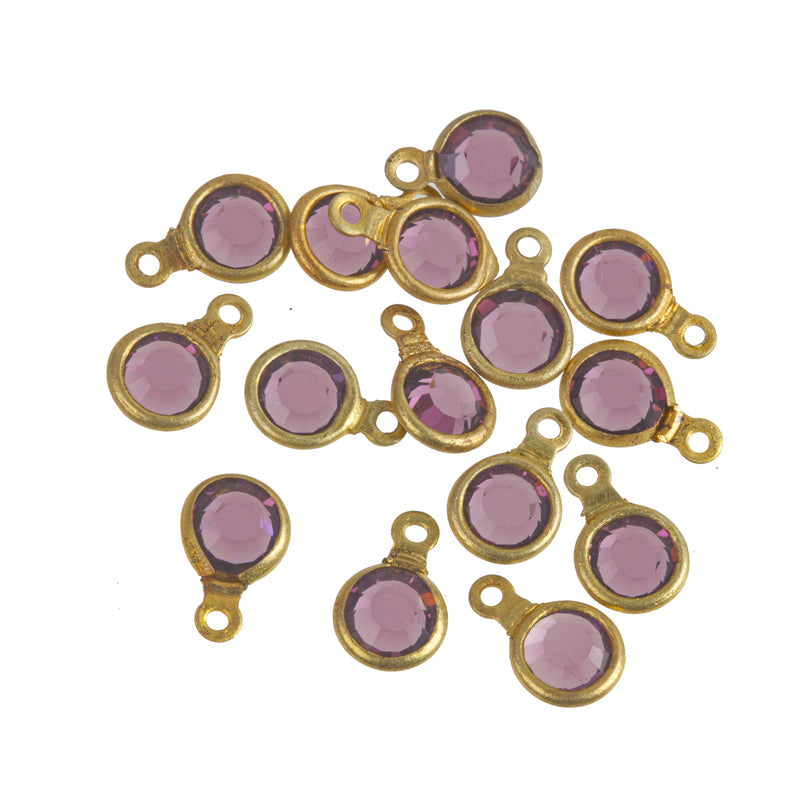 Austrian crystal and brass rounds-Size 17ss amethyst 1 ring, 4.5mm. Pkg 12. b10-0117g