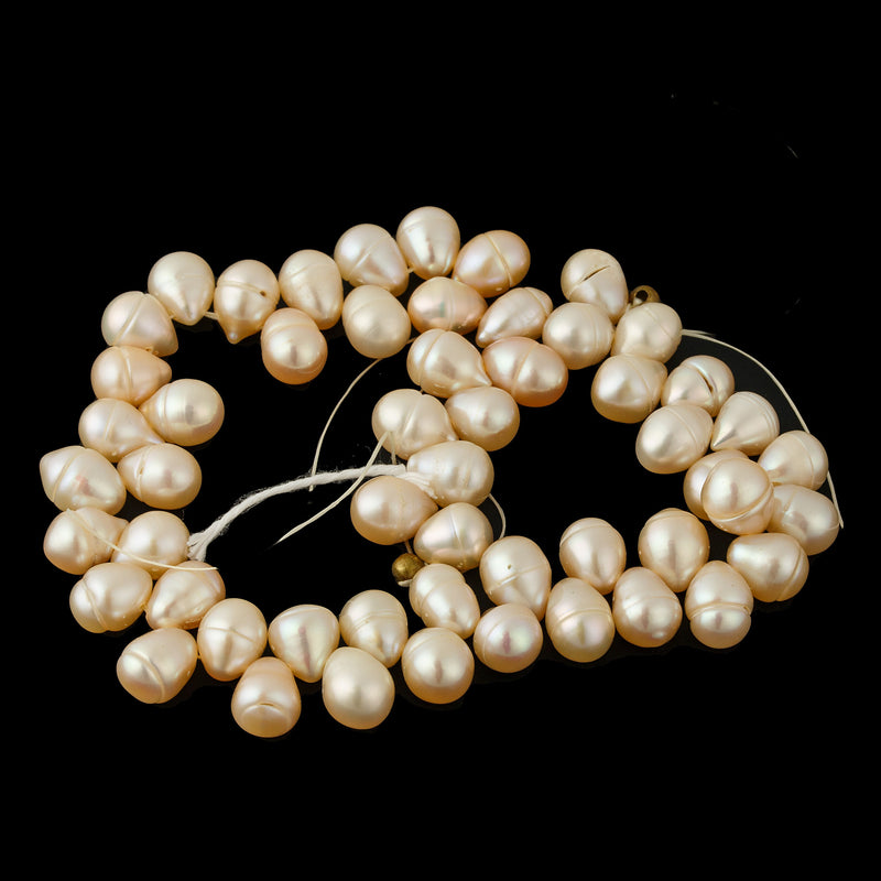 Drop Shaped apricot pearls, semi baroque/circled, about 9mmx8mm, 9"strand. b15-prl156
