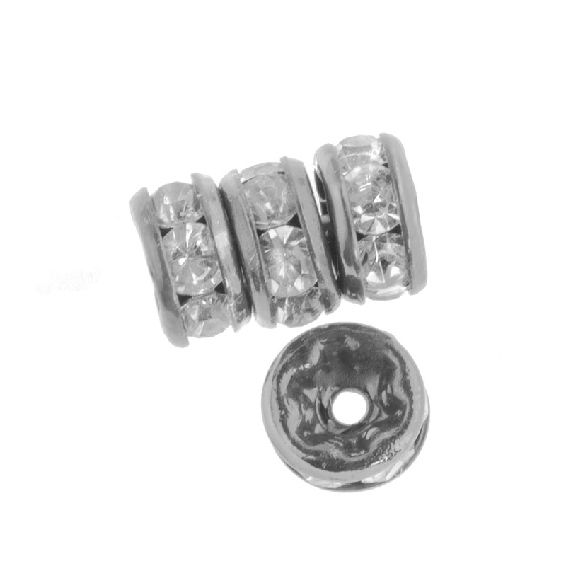 Clear crystal silver plated rondelles. 8mm. Pkg of 4. b18-0270-3