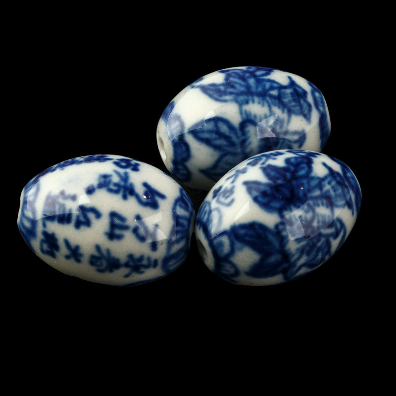 Vintage foliar Chinese white and blue porcelain oval bead with calligraphy. 18x13mm. Pkg1. B2-936
