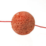 Rare bead of Japanese Momo precious coral with perforations caused by the boring-sponge. 1 bead. 20.5mm. b4-cor461