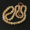 Moonstone beads, translucent peach rounds,Graduated 19" Str. Pkg 1. b4-moo221
