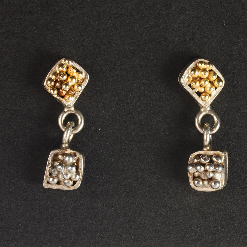 Gold Granulation and Sterling Silver Earring, signed T. Doran. j-ervn1011