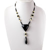 Early Art Deco Bohemian black and white uranium glass, 19" necklace. nlbg2209