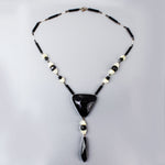 Early Art Deco Bohemian black and white uranium glass, 19" necklace. nlbg2209