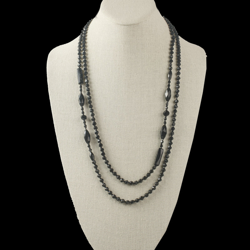 Early 20th century Edwardian Bohemian jet glass faceted bead necklace. 52 inches. j-nled505