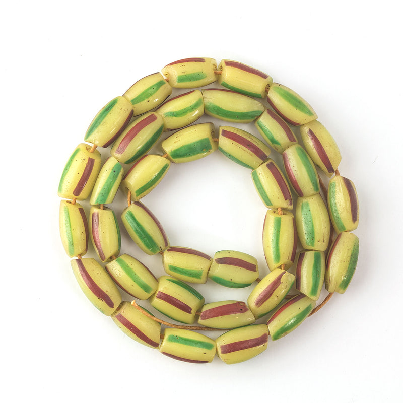 Antique yellow, red and green striped trade beads. 17" strand. 