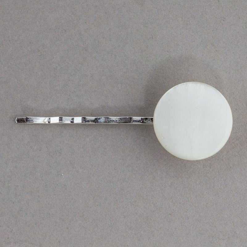 Vintage mother of pearl button hair pin.