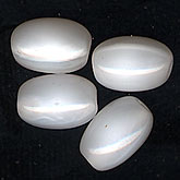 West German pearlescent white glass ovals. Look like arboreo rice. 7mm. Pkg. of 25.
