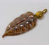 Vintage amber glass luster leaf pendant. 20mm. Pkg of 10