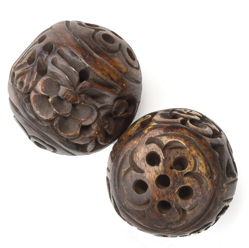 Carved, pierced and stained hollow bone beads. Sold individually. b3-bo183