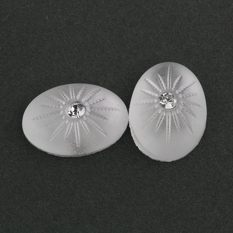 Frosted matte crystal domed 18x13mm flat back oval cabochon with crystal stone. Pkg. 2.