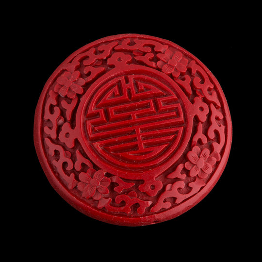 Carved red cinnabar disk. 55mm pkg of 1. B7-CIN017