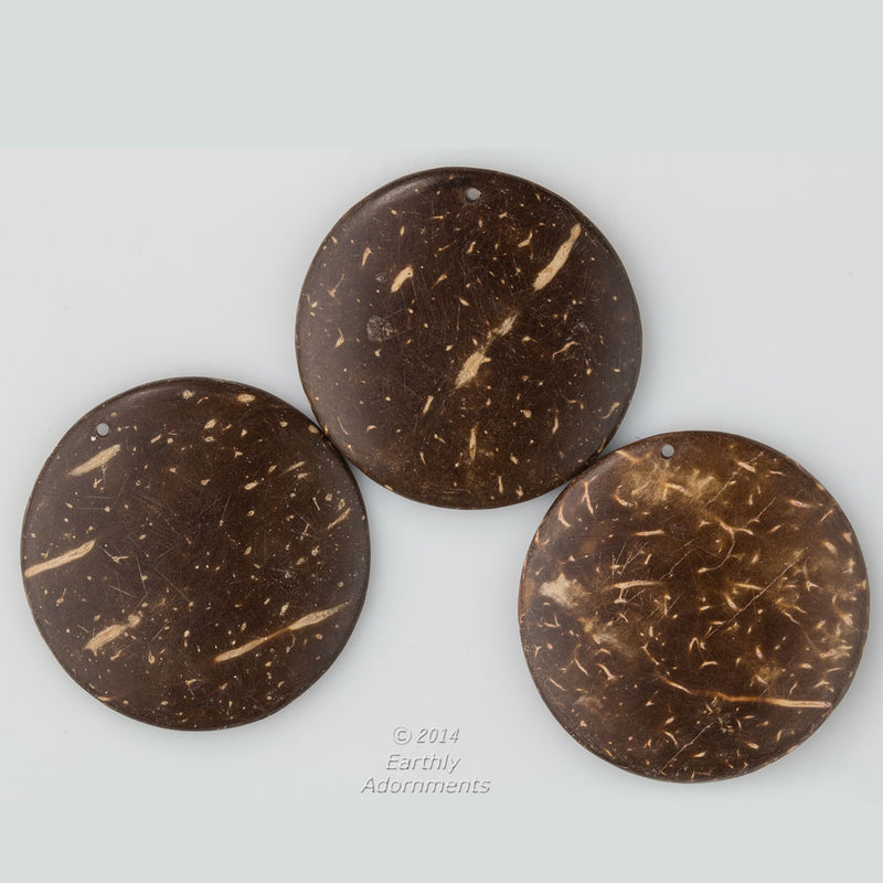  Vintage coconut shell disk pendants. 30mm diameter.