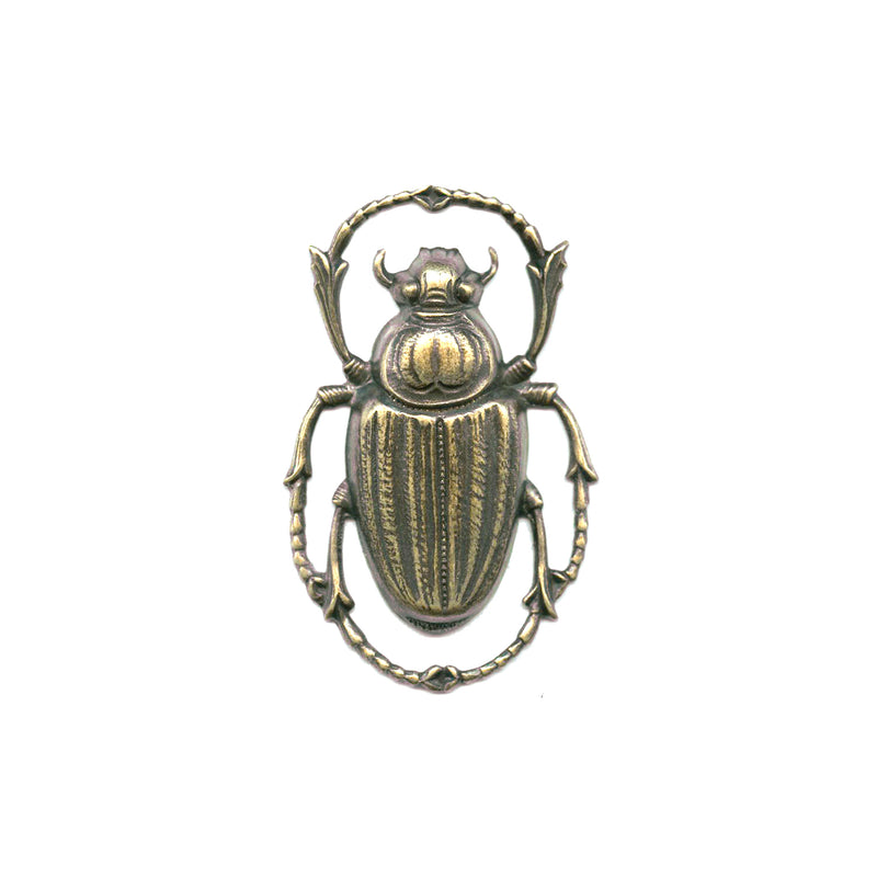 Oxidized brass Egyptian Revival style scarab stamping. 43x28mm sold individually.