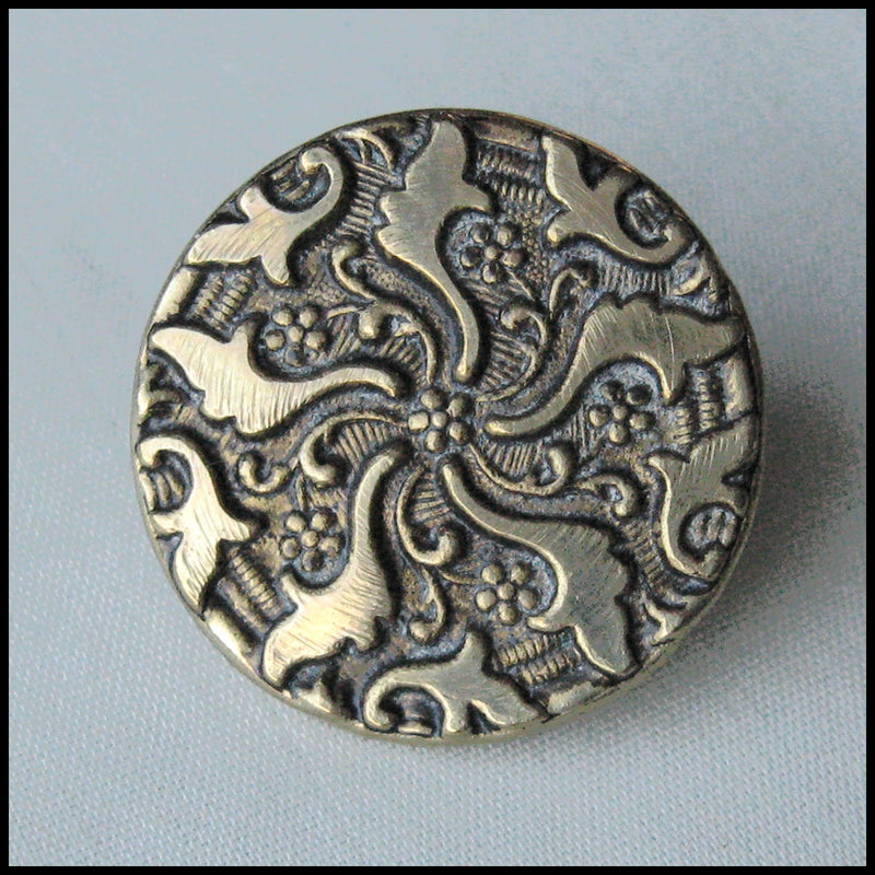 Antique stamped ornamental button 7/8 inch.