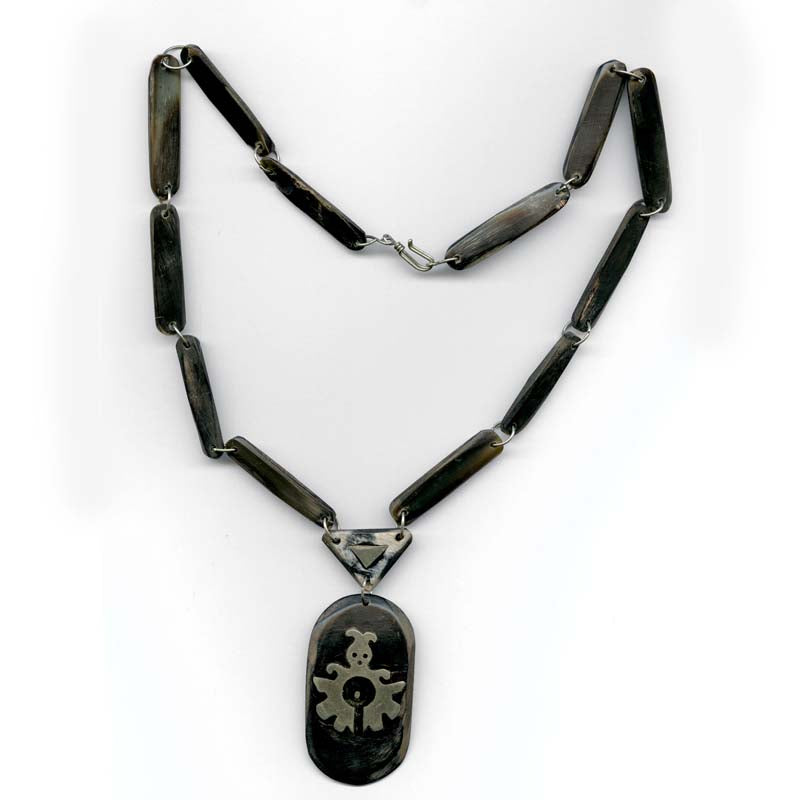 Vintage black horn pendant and necklace with silver overlay