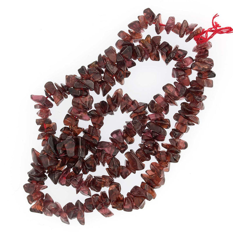 16 inches of old stock India Almandine garnet flat chip beads. 