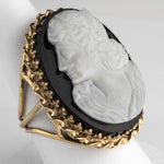 Cameo carved from single bulls eye agate stone set in 14k gold ring setting Size 7.