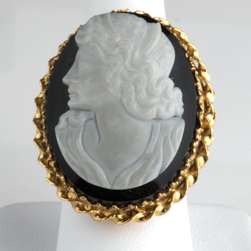 Cameo carved from single bulls eye agate stone set in 14k gold ring setting Size 7.
