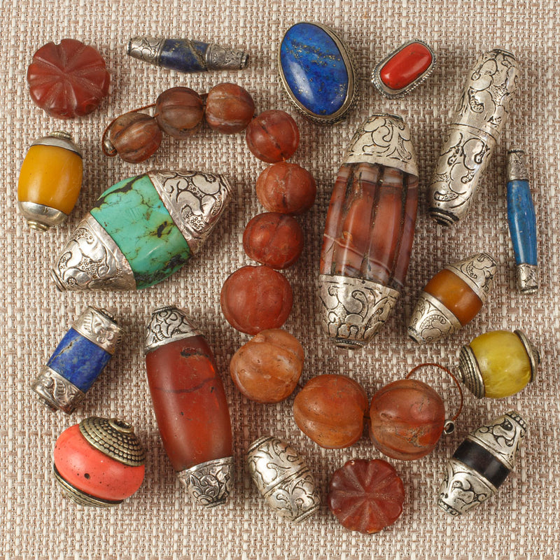 Vintage Tibetan Amber resin oval bead with coin silver bead caps. 46x2 –  Earthly Adornments