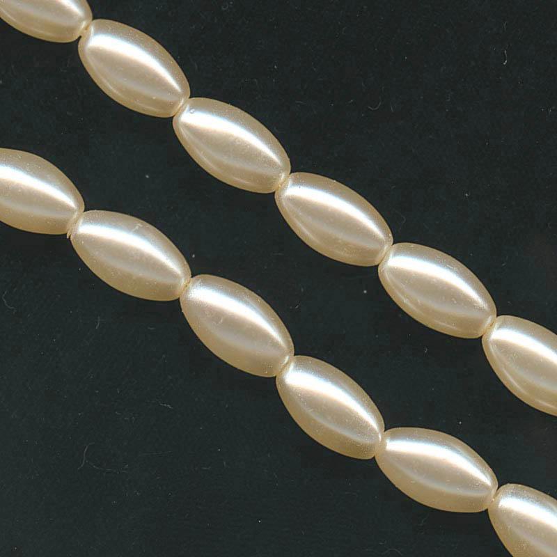 Strand of oval artificial pearls