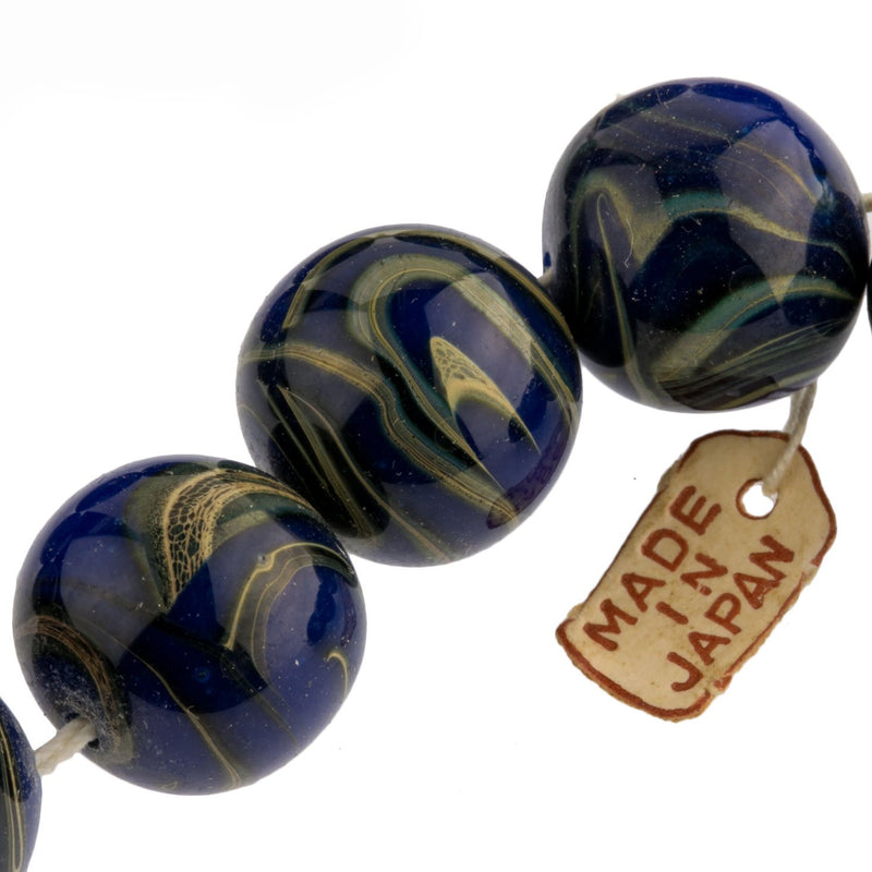 Japanese round beads dark blue with marbilized tan