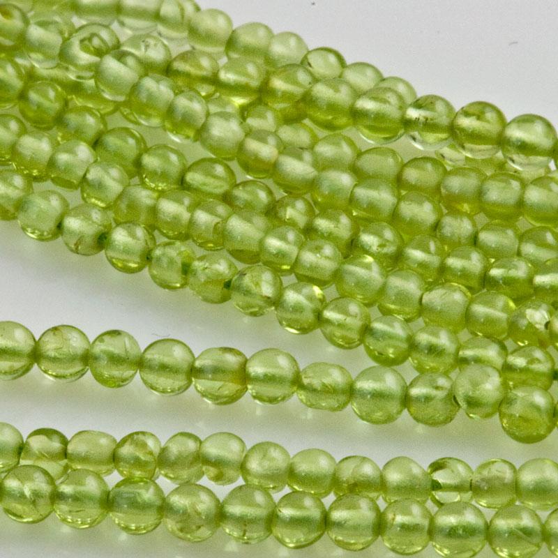 Green transparent peridot round bead strands