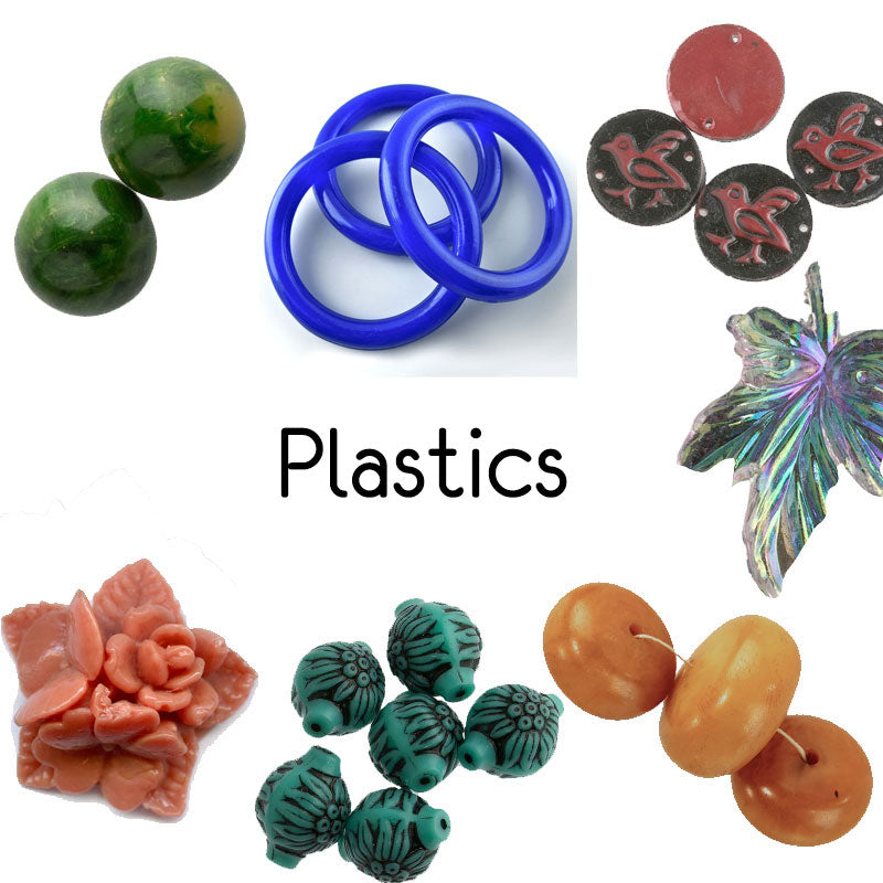 Selection of plastic rings, cabochons in mustard, red, green and frosted