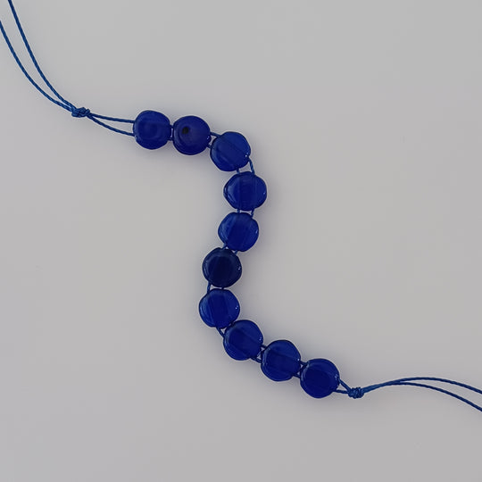 Antique Bohemian glass  translucent blue 2-hole sequin beads. 7mm. Pkg of 25. b11-bl-0948