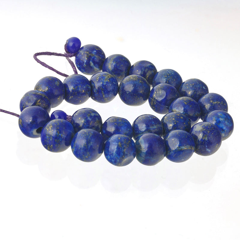 Vintage natural lapis lazuli 9.5mm rounds. 8" inch strand. b4-lap304
