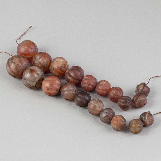 Old carved opaque carnelian agate melon beads. Strand of 10.  Nepal.  B4-car428