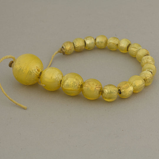 Vintage Venetian lampwork yellow foil graduated bead strand.  b1-3023