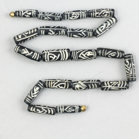 Vintage hand carved stained bone cylinders, avg. 26x9mm,19 inch strand. b3-bo137