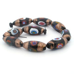 Venetian oval millefiori glass beads, with metallic aventurina stripes. 9 beads, Pkg1 Str. b1-3004