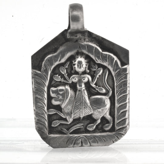 Hindu amulet pendant of Goddess Durga riding lion. b18-0614cs