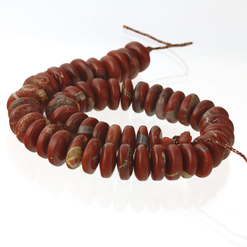 Vintage natural brecciated red jasper saucer beads. Approximately 9.5mm x 3 - 4mm. 8 in strand. b4-jas291