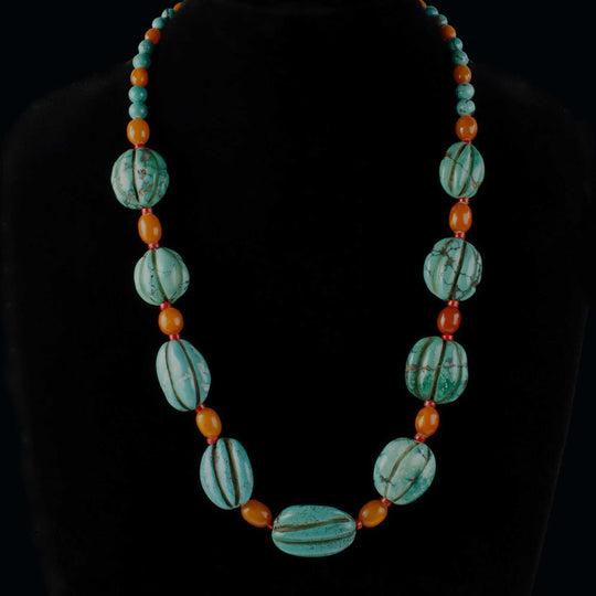 Carved Turquoise Melon Bead Necklace with yellow amber and coral. j-nlbd1292