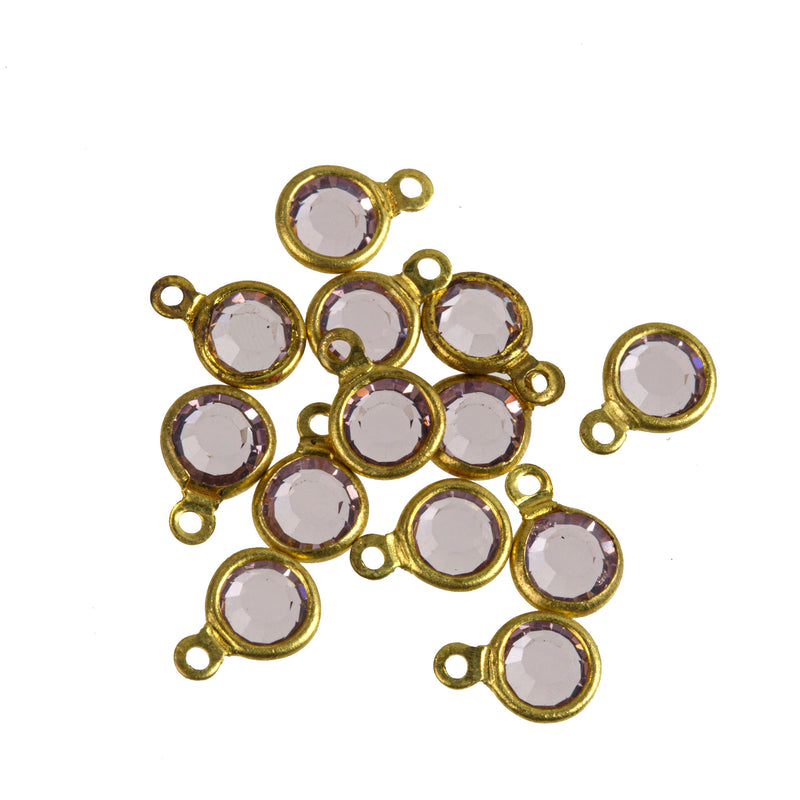 Austrian crystal and brass rounds-Size 17ss, Light amethyst. 1 ring, 4.5mm. Pkg 12. b10-0117b
