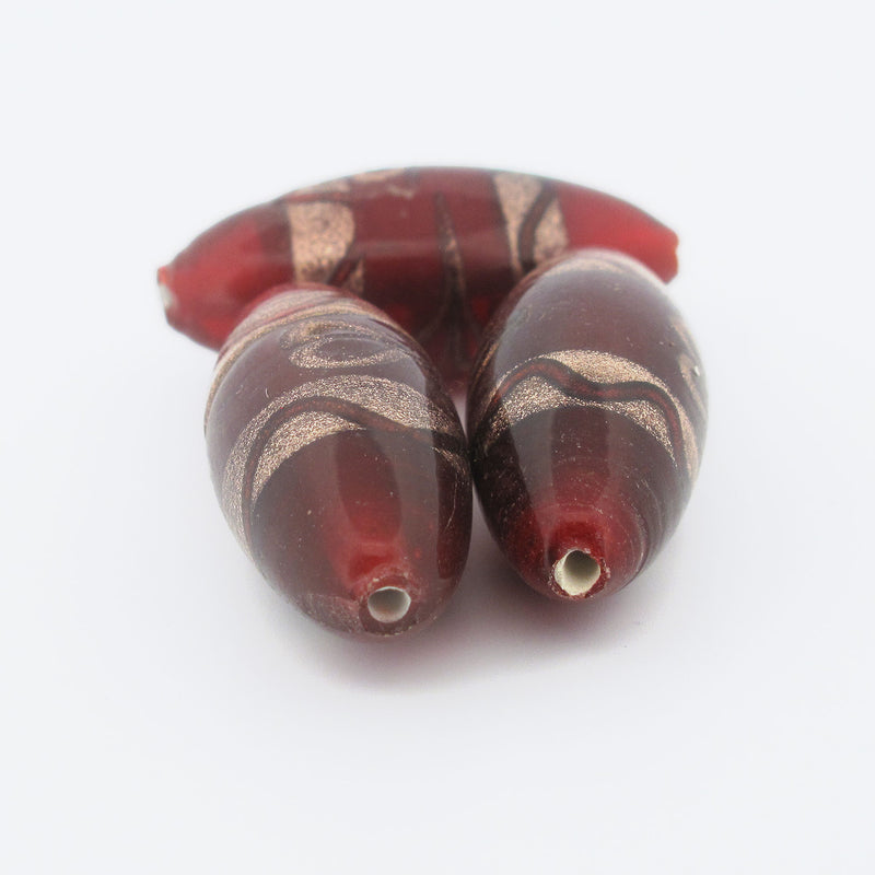 Venetian oval cranberry glass beads, with metallic aventurina stripes. Pkg1. b11-rd-0912
