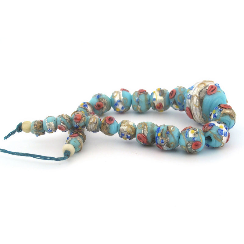 Vintage graduated strand 24 light blue Venetian Fiorato Wedding Cake glass beads. 1900. 7mm to 13mm. b11-bl-2168