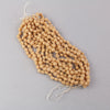 Antique opaque tan glass nailheads. 4mm. 1 hank of 12 strands. 300 beads.  b11-br-0712