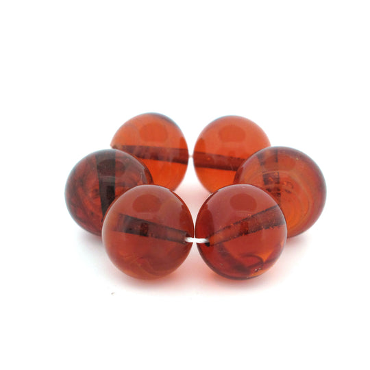 Hand-made root beer translucent glass beads.  China 1970s. 10mm.  Pkg. of 4.  b11-br-0816