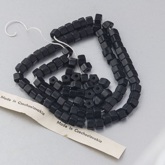 Vintage black glass pentagon beads.  4x6mm. Czechoslovakia.  16 inch strand. b11-bw-0893