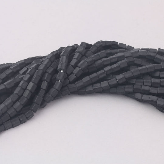 Vintage black glass pentagon beads.  4x6mm. Czechoslovakia.  16 inch strand. b11-bw-0893