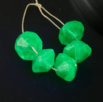 Emerald Green vaseline glass (Uranium) trade beads. 11x15mm. Pkg 5. b11-gr-2074