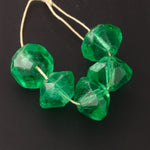 Emerald Green vaseline glass (Uranium) trade beads. 11x15mm. Pkg 5. b11-gr-2074