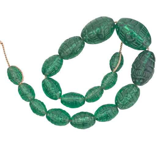 Bohemian bottle green pressed glass oval beads from Gablonz,Czechoslovakia. 1920s. b11-gr-2083