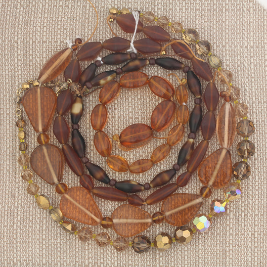 7 golden amber vintage glass bead strand mix. b11-mx01